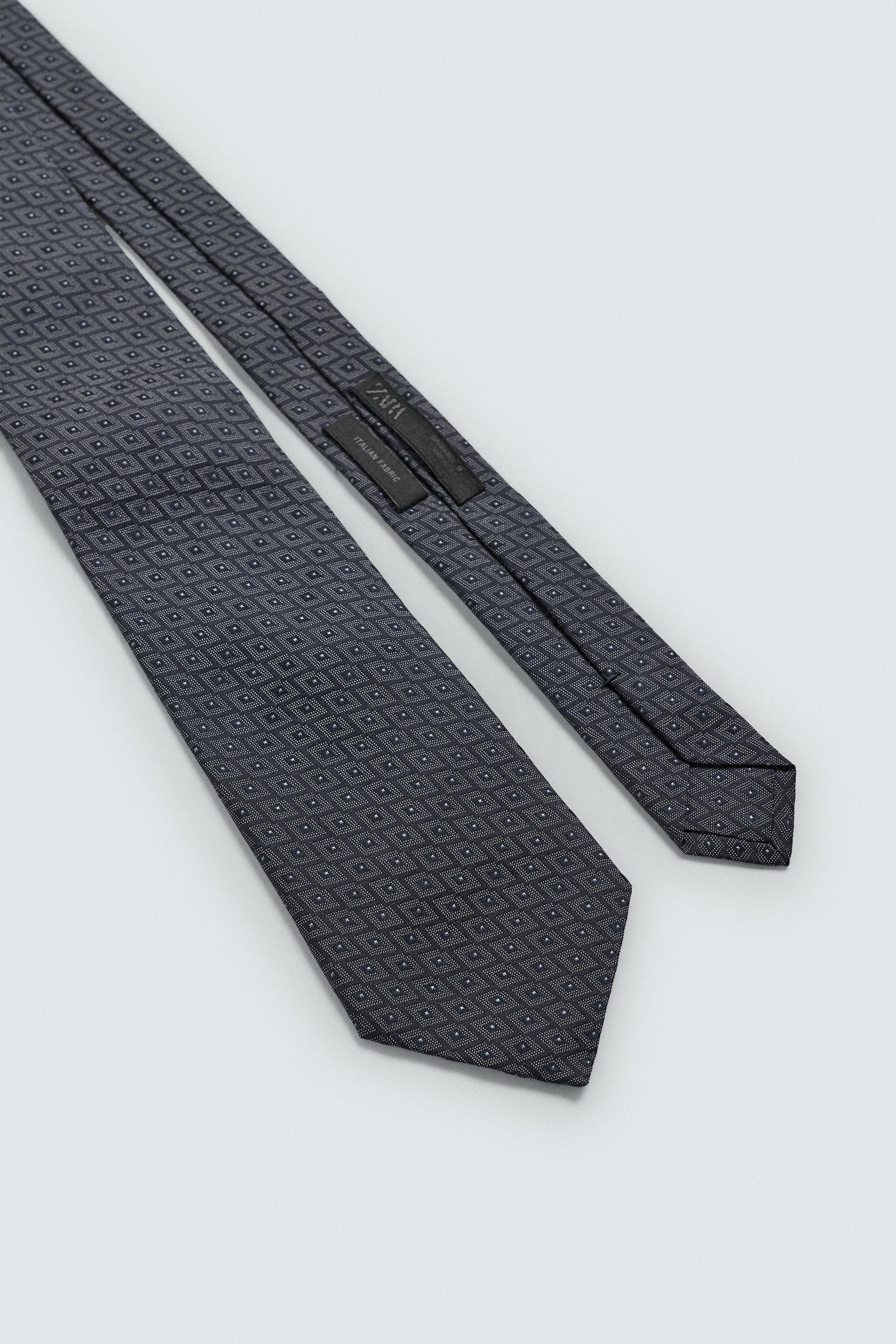 CRAVATE JACQUARD GÉOMÉTRIQUE 100% SOIE